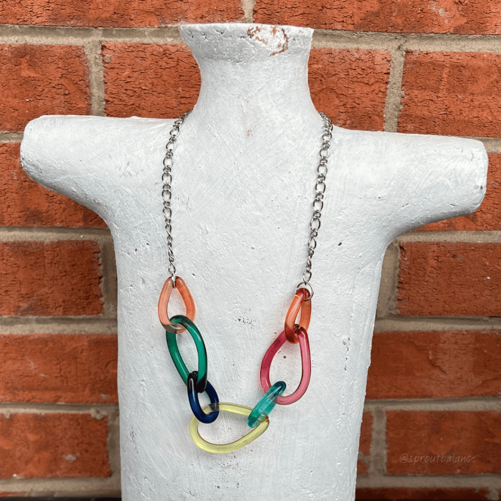 Colourful teardrop necklace upcycled with a longer silver chain. 